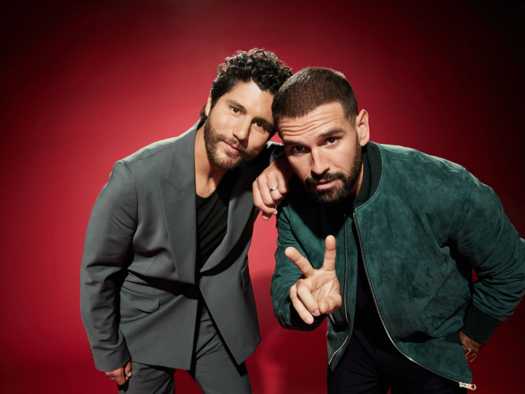alt="Dan and Shay on stage amid false wife death rumors"