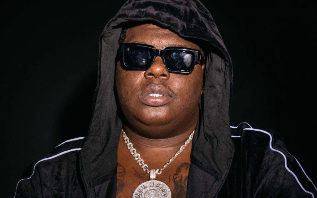 alt="BigXthaPlug performing at a 2025 concert in Dallas"