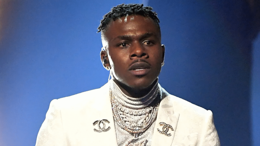 alt="DaBaby and his brother Glenn Johnson in a family photo"