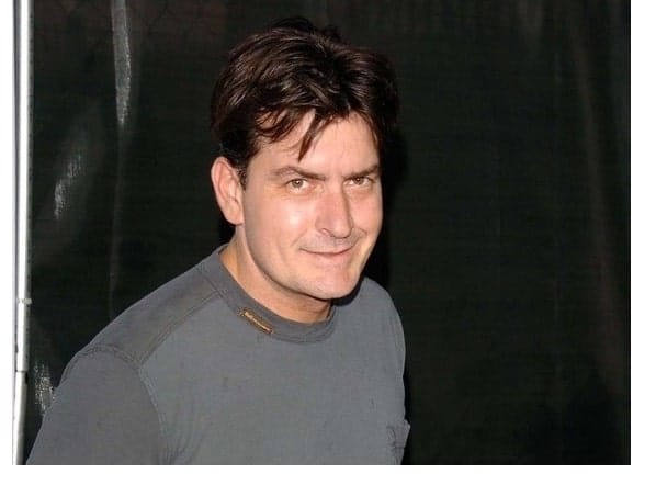 Charlie Sheen in a suit during his Two and a Half Men days – peak of Charlie Sheen net worth
