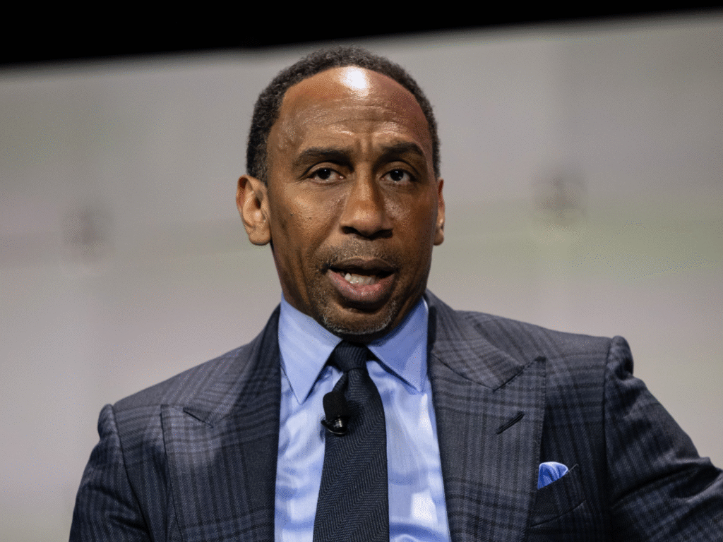 alt="Stephen A. Smith with his daughter at a public event"