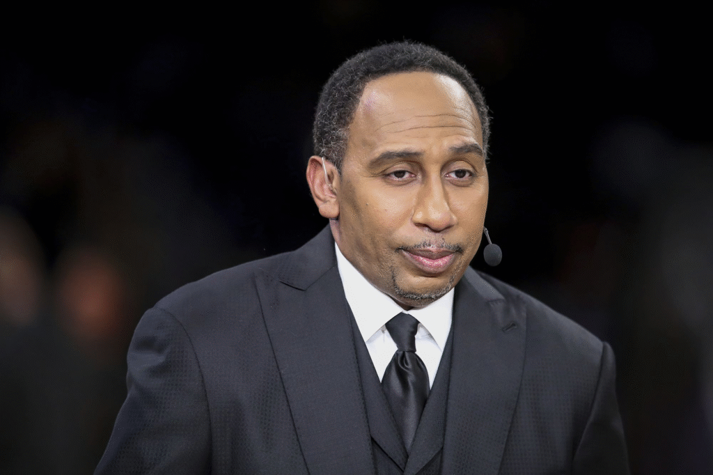 alt="Happy moment between Stephen A. Smith and his daughters"